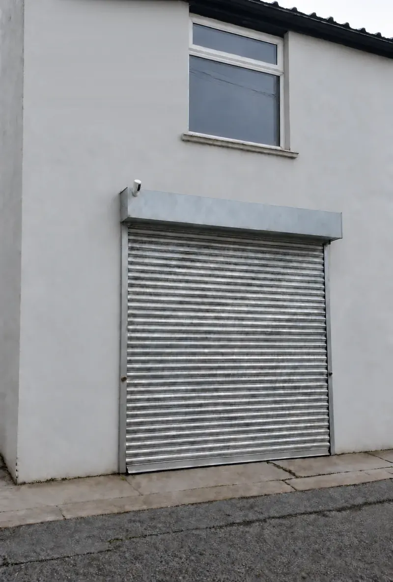 Outside the 300 sq ft two-storey unit at Business Spaces, with its roller shutter
