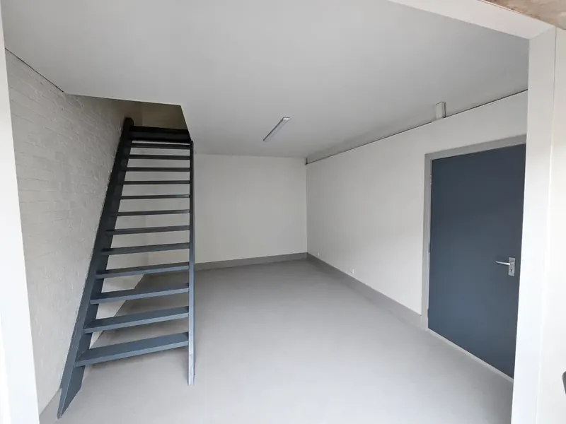 Staircase up to the office in the two-storey unit